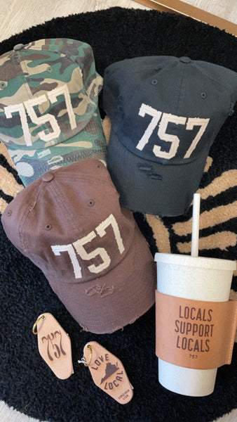 757 baseball hat in black, brown, and camo.